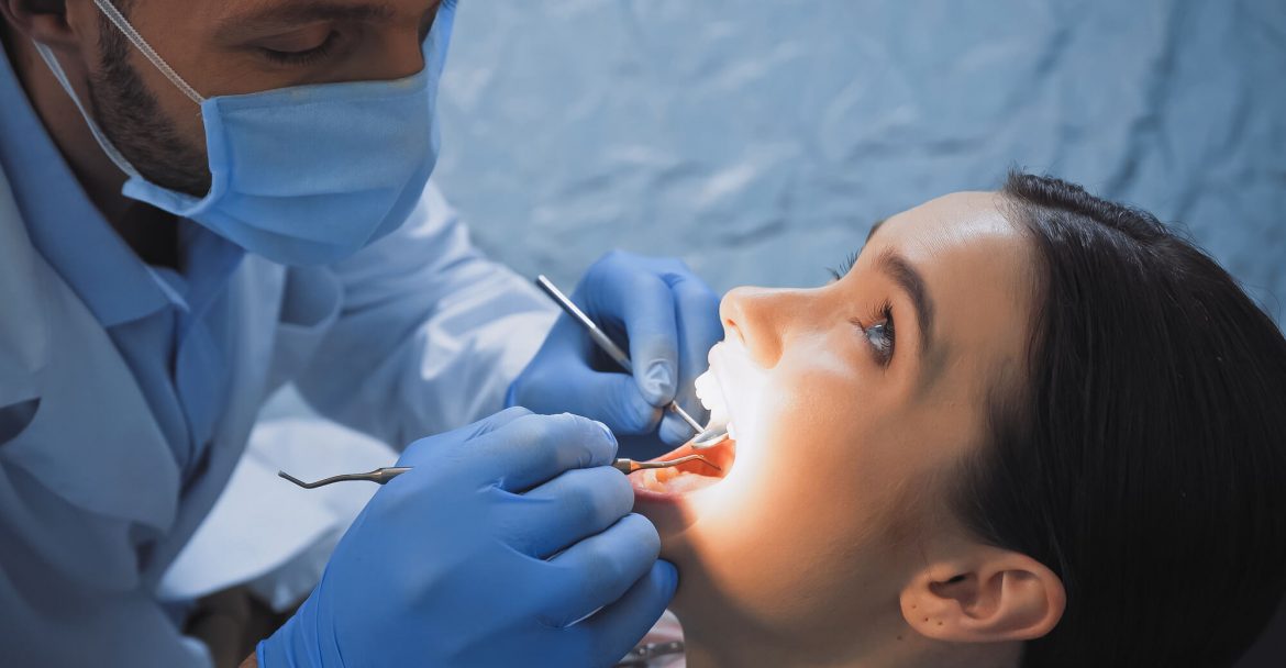 Woman getting checked for Same day Crowns midtown Manhattan