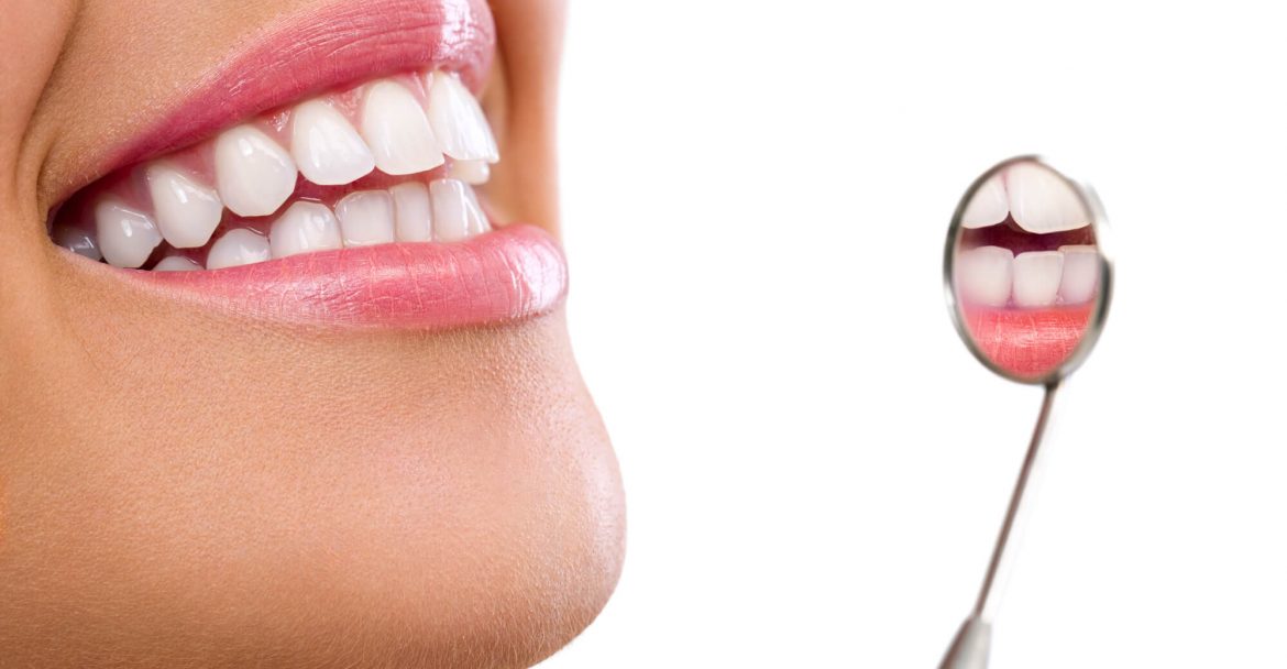 a smiling patient at the Dentist in midtown Manhattan 