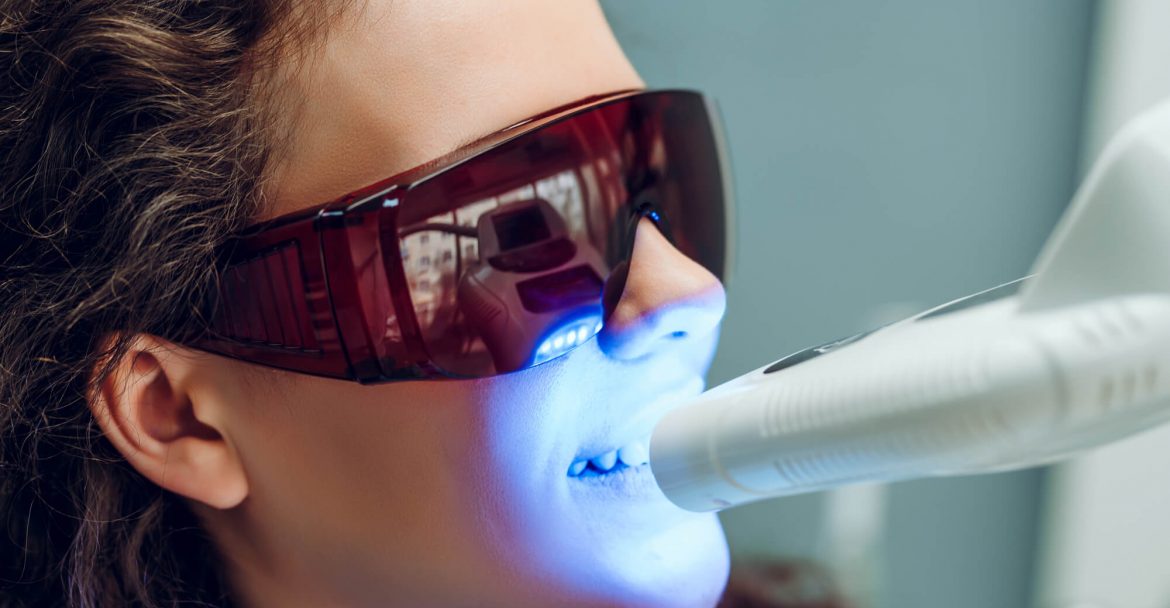 female patient experience the power of Laser Dentistry midtown Manhattan